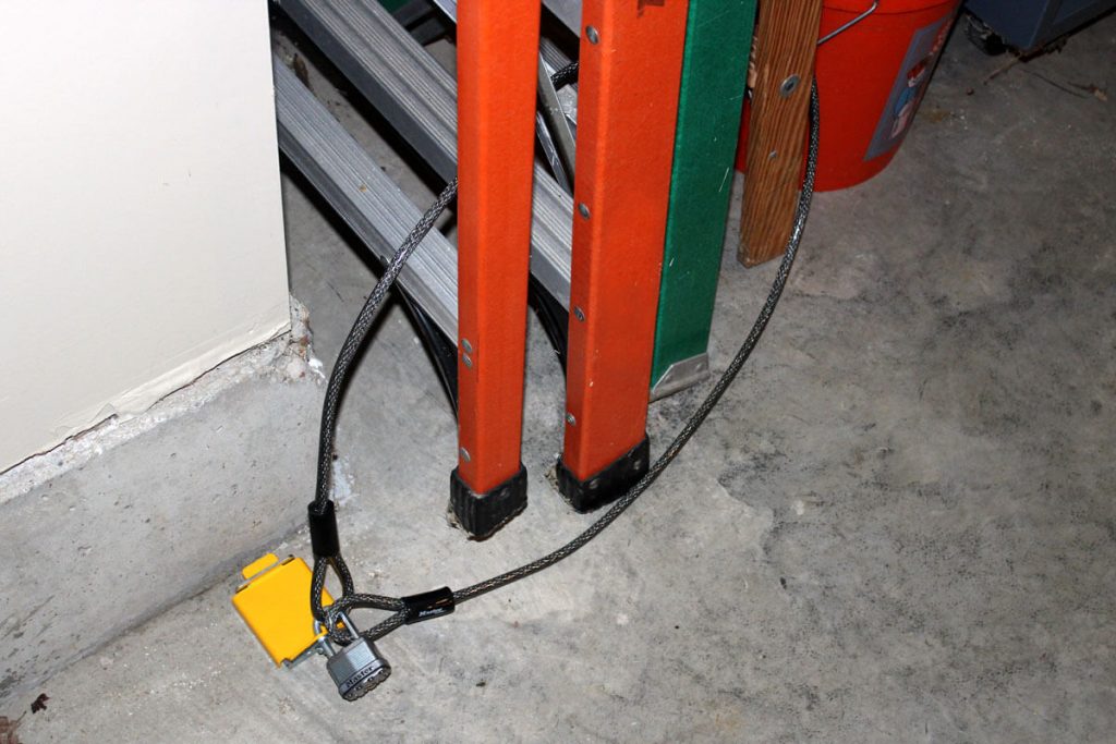 AnchorHog® securing garage equipment